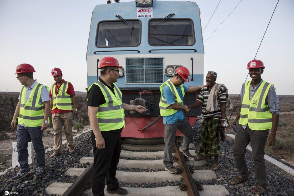 A local resident greets Chinese and African workers on the Addis Ababa–Djibouti railway during a trial run in Addis Ababa, Ethiopia, Sept 28, 2016. Source: https://www.chinadaily.com.cn/a/201910/22/WS5dae6245a310cf3e35571d42.html