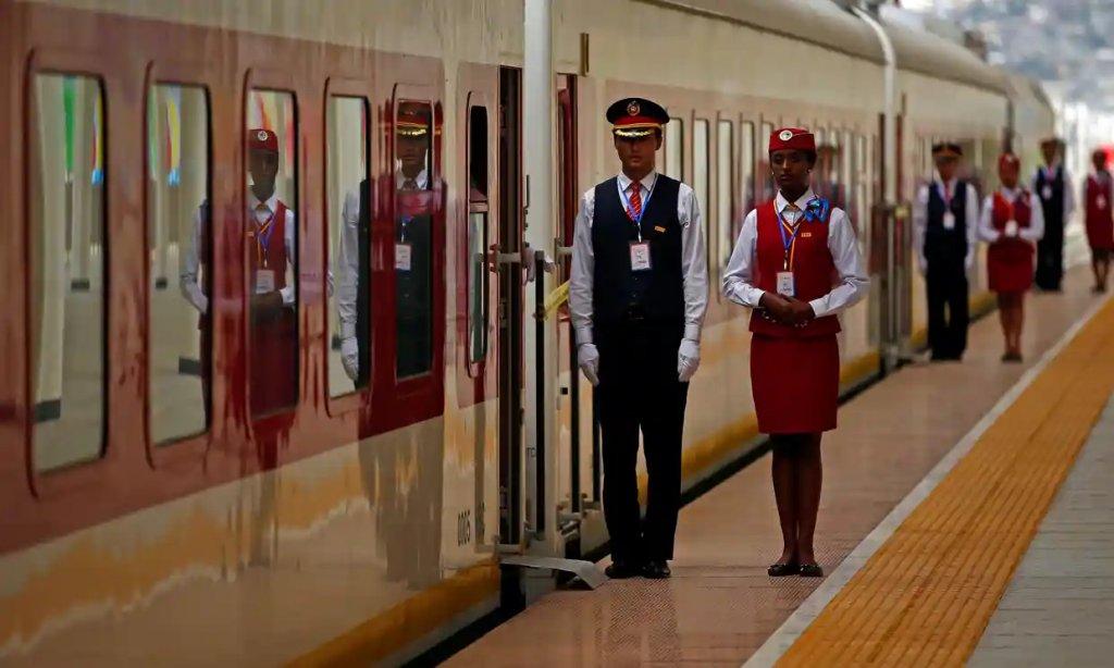 Chinese and local staff during the inauguration of the new train line linking Addis Ababa to the Red Sea state of Djibouti, Oct 5, 2016. Source: https://www.theguardian.com/world/2016/oct/06/next-stop-the-red-sea-ethiopia-opens-chinese-built-railway-to-djibouti