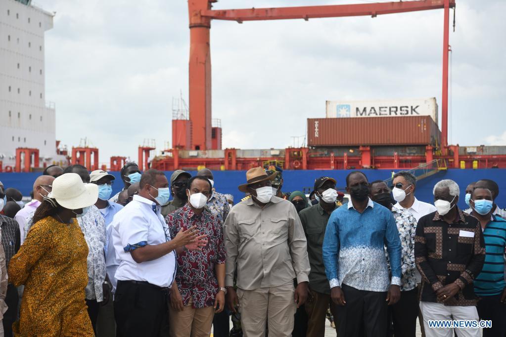 Kenya's President Uhuru Kenyatta (3rd R, front) witnesses the docking of two vessels at the new harbor of Lamu Port in Kenya, May 20, 2021. Source: http://www.xinhuanet.com/english/2021-05/21/c_139959211_7.htm