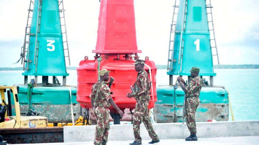 Police officers patrol at the Lamu Port following the arrival of the first batch of equipment on April 28, 2021. Source: https://www.theeastafrican.co.ke/tea/business/operations-test-at-new-lamu-port-starts-may-3381606