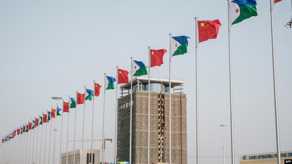 National flags of China and Djibouti fly in front of Djibouti International Free-Trade Zone before the inauguration ceremony in Djibouti, July 5, 2018. Source: https://www.voanews.com/a/djibouti-new-free-trade-zone-creates-opportunities-deepens-dependency/4478305.html