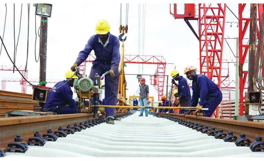 Workers working on the railway. Source: https://www.enr.com/articles/45257-global-best-projects-2018-award-of-merit-rail-mombasa-to-nairobi-standard-gauge-railway-project